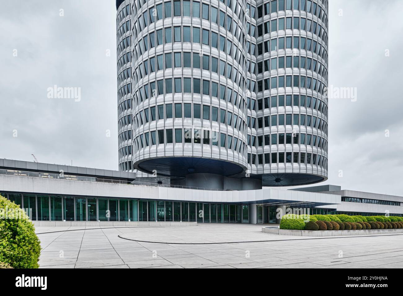 Munich, Germany - April 18, 2024: Exterior view of the office building and the museum of BMW (Bayerische Motoren Werke) Stock Photo