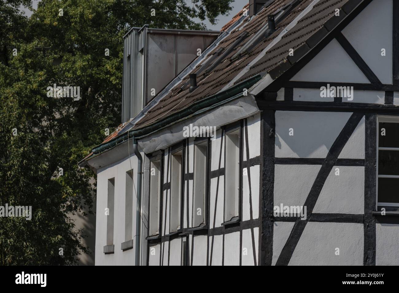 A traditional halftimbered house with white