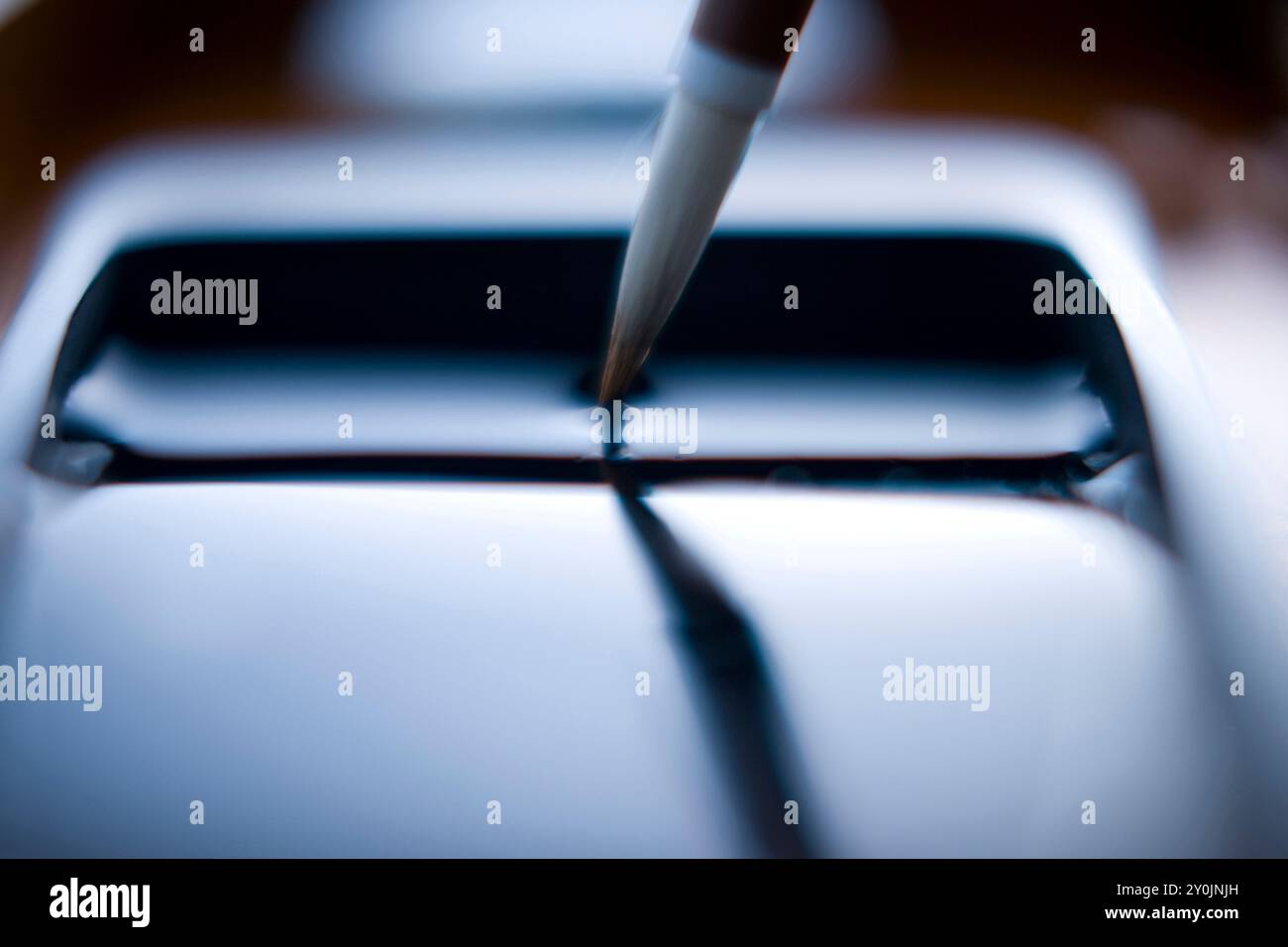 Writing brush and ink stone Stock Photo