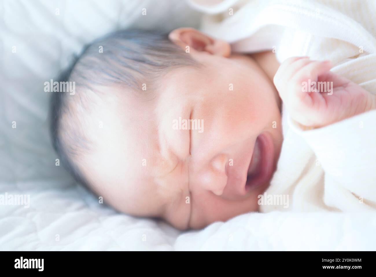 Newborn crying Stock Photo