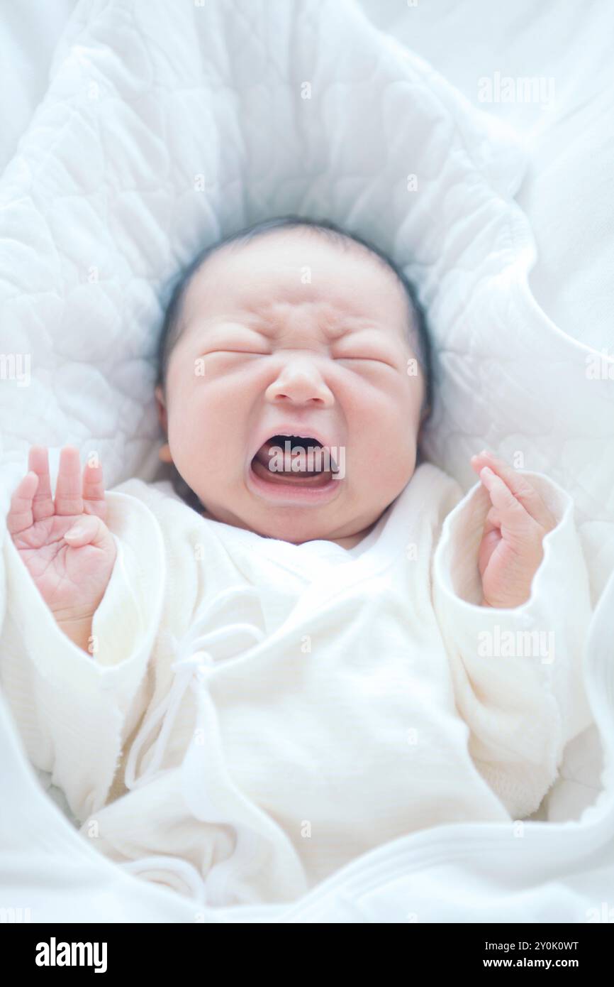 Newborn crying Stock Photo