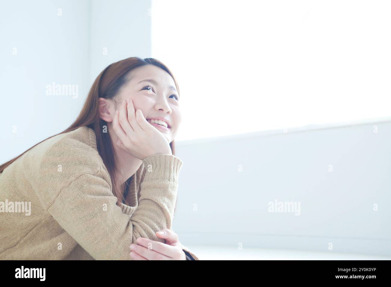 Profile of woman in her 20s smiling Stock Photo - Alamy
