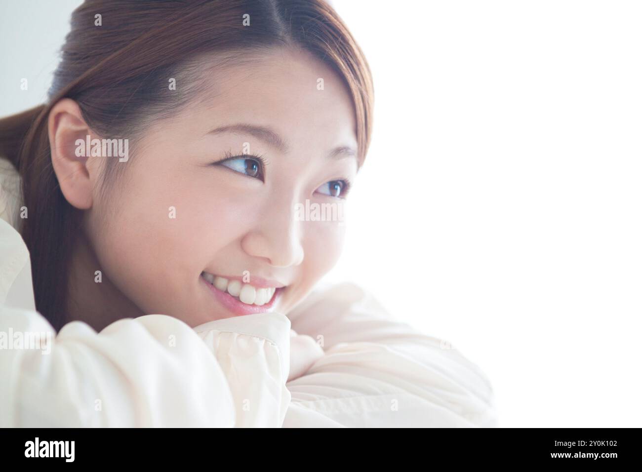 Profile of woman in her 20s smiling Stock Photo - Alamy