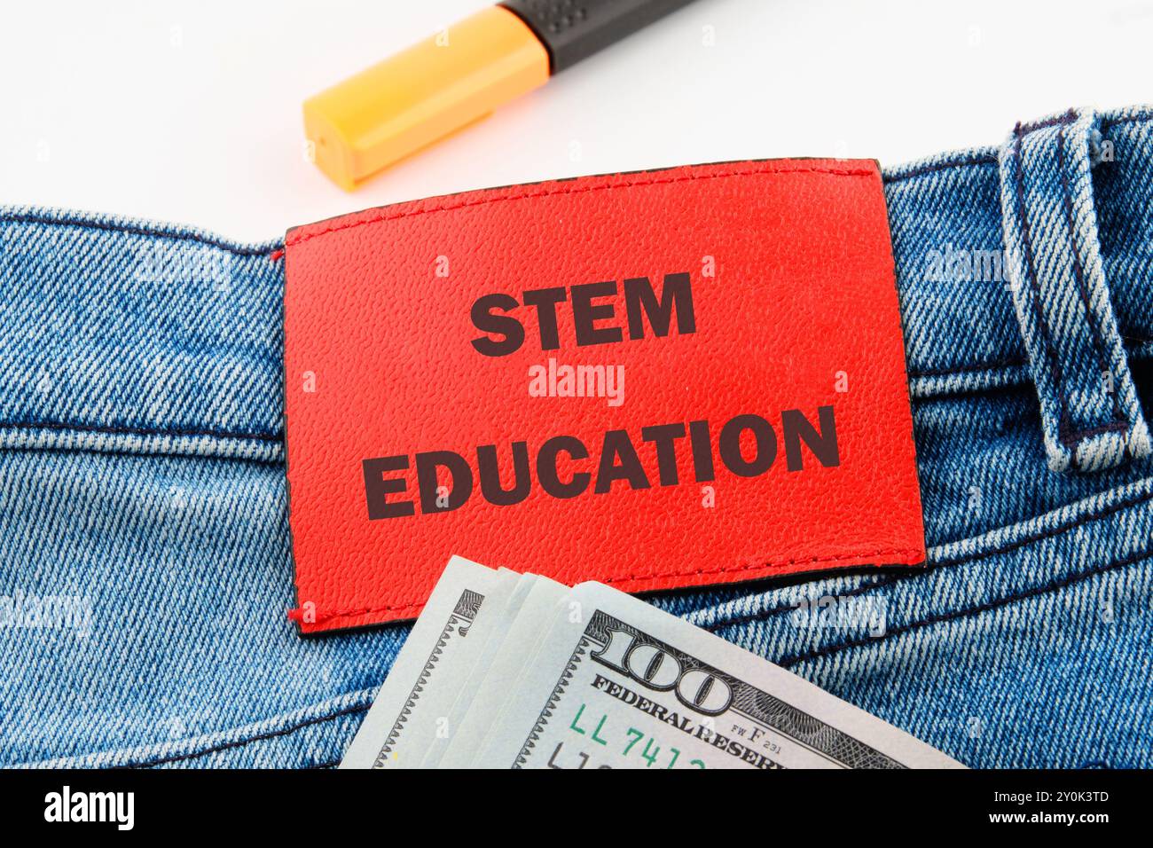 STEM Education. Science Technology Engineering Mathematics. STEM EDUCATION words on the jeans tag Stock Photo