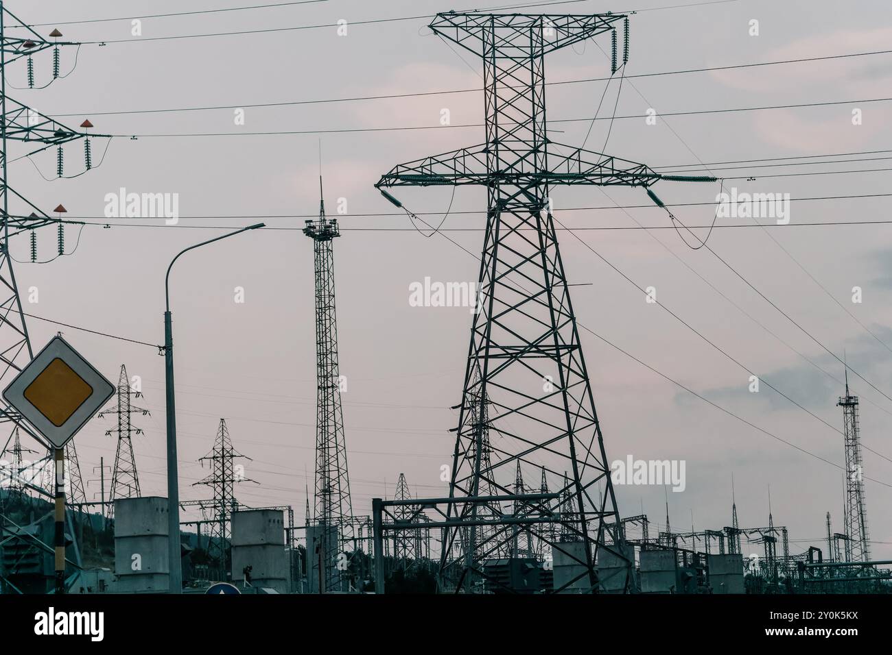 Power Lines and Towers in a Cloudy Sky Stock Photo - Alamy