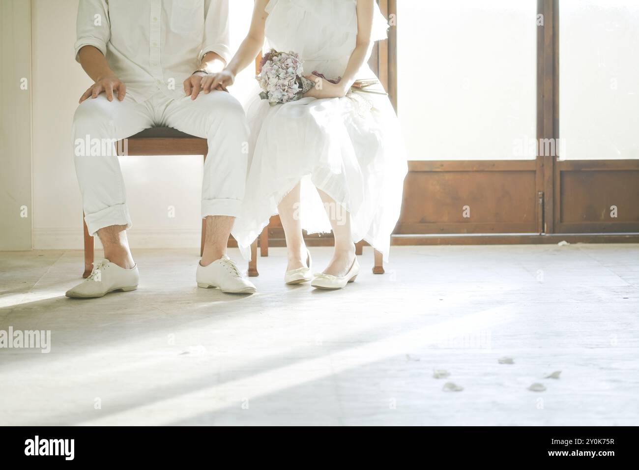 Groom sitting on chair hi-res stock photography and images - Alamy