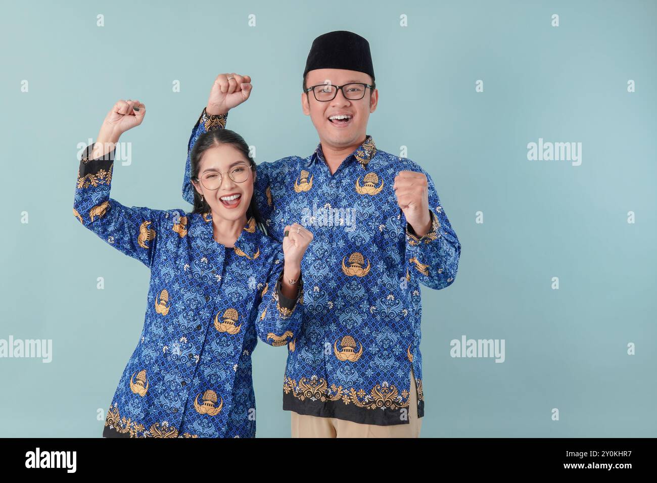 Man wearing glasses raising fist hi-res stock photography and images ...