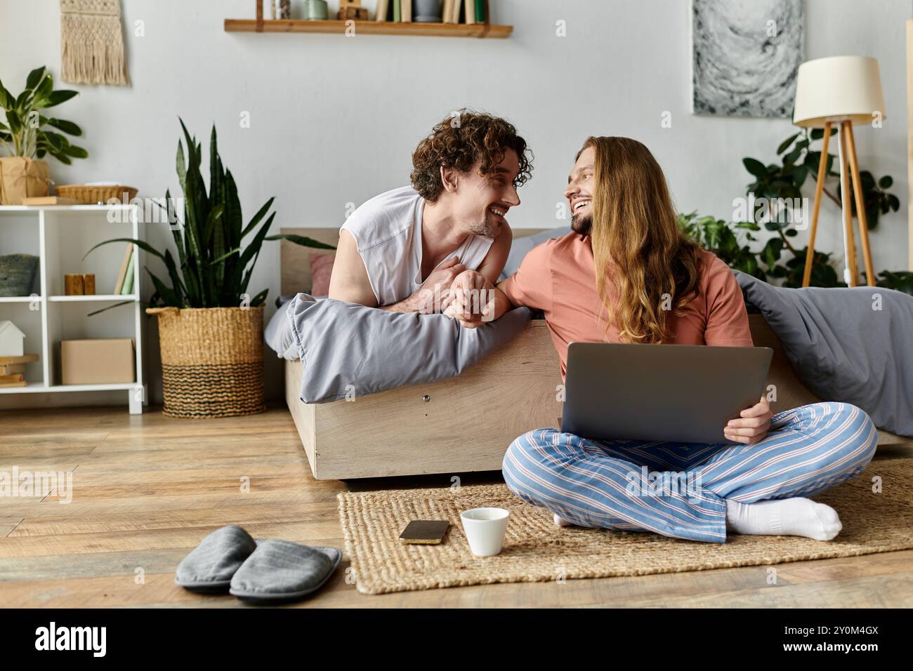Joyful lgbtq couple shares hi-res stock photography and images - Alamy