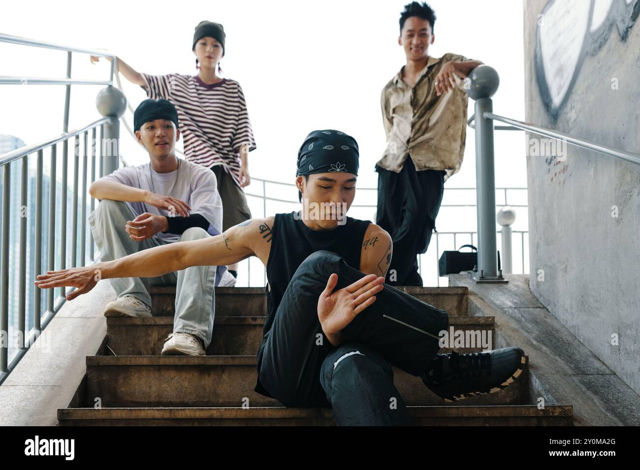 Enjoying Hip-Hop Dance Outdoors on Urban Staircase Stock Photo