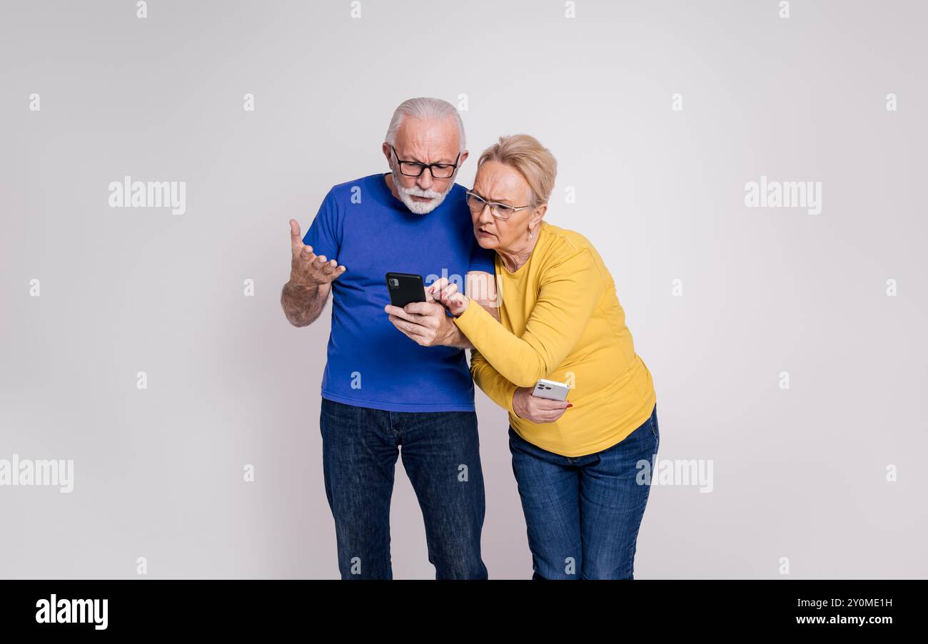 Jealous mature woman Man phone jealous woman mature hi-res stock photography and images - Alamy