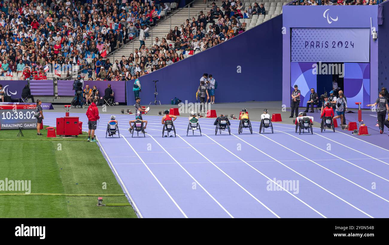 Paralympic athletes at the start of the Women's 5000 m wheelchair final