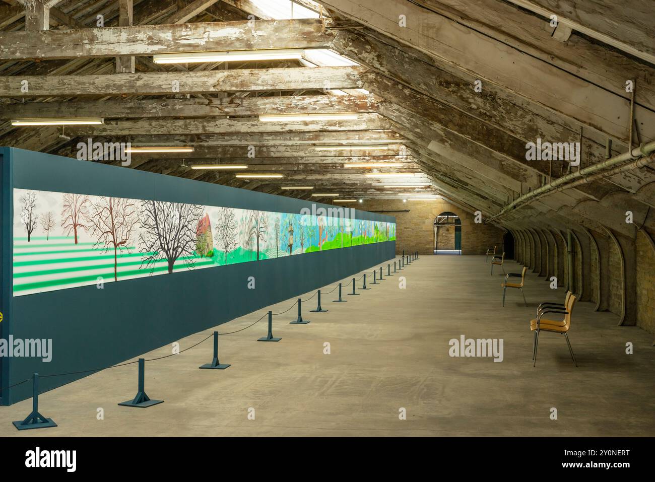 DAVID HOCKNEY A YEAR IN NORMANDIE in the Roofspace of Salts Mill in Saltaire Village of Saltaire Bradford West Yorkshire England UK GB Europe Stock Photo