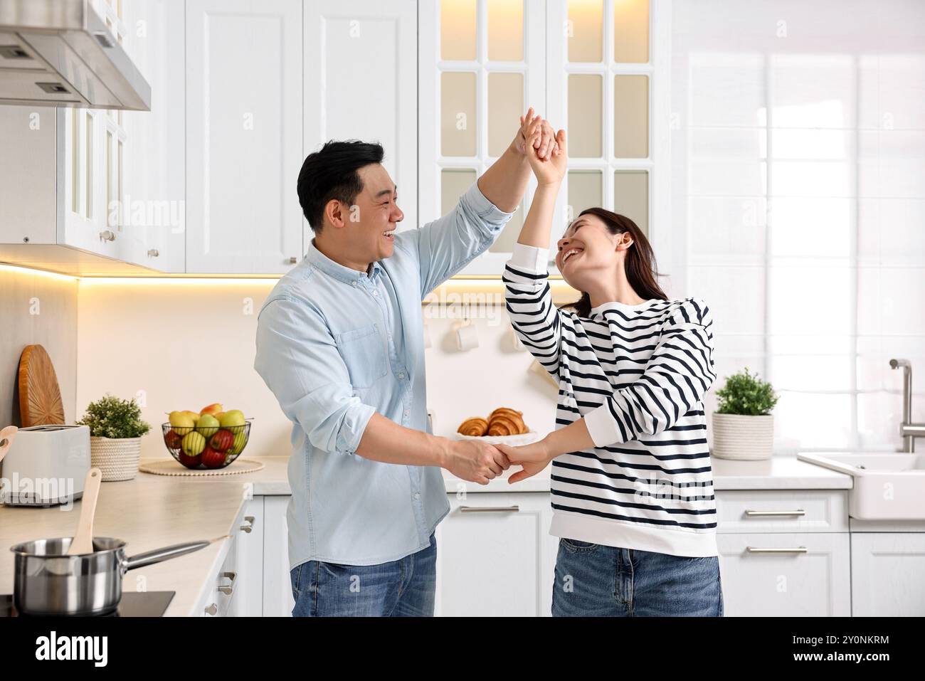 Lovely asian woman happy dancing hi-res stock photography and images ...