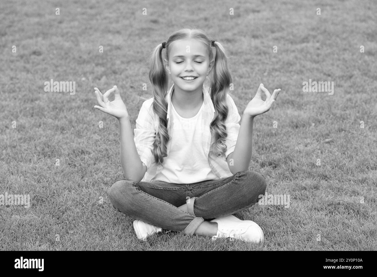 girl relax peacefully on the grass. happy childhood of teen girl ...