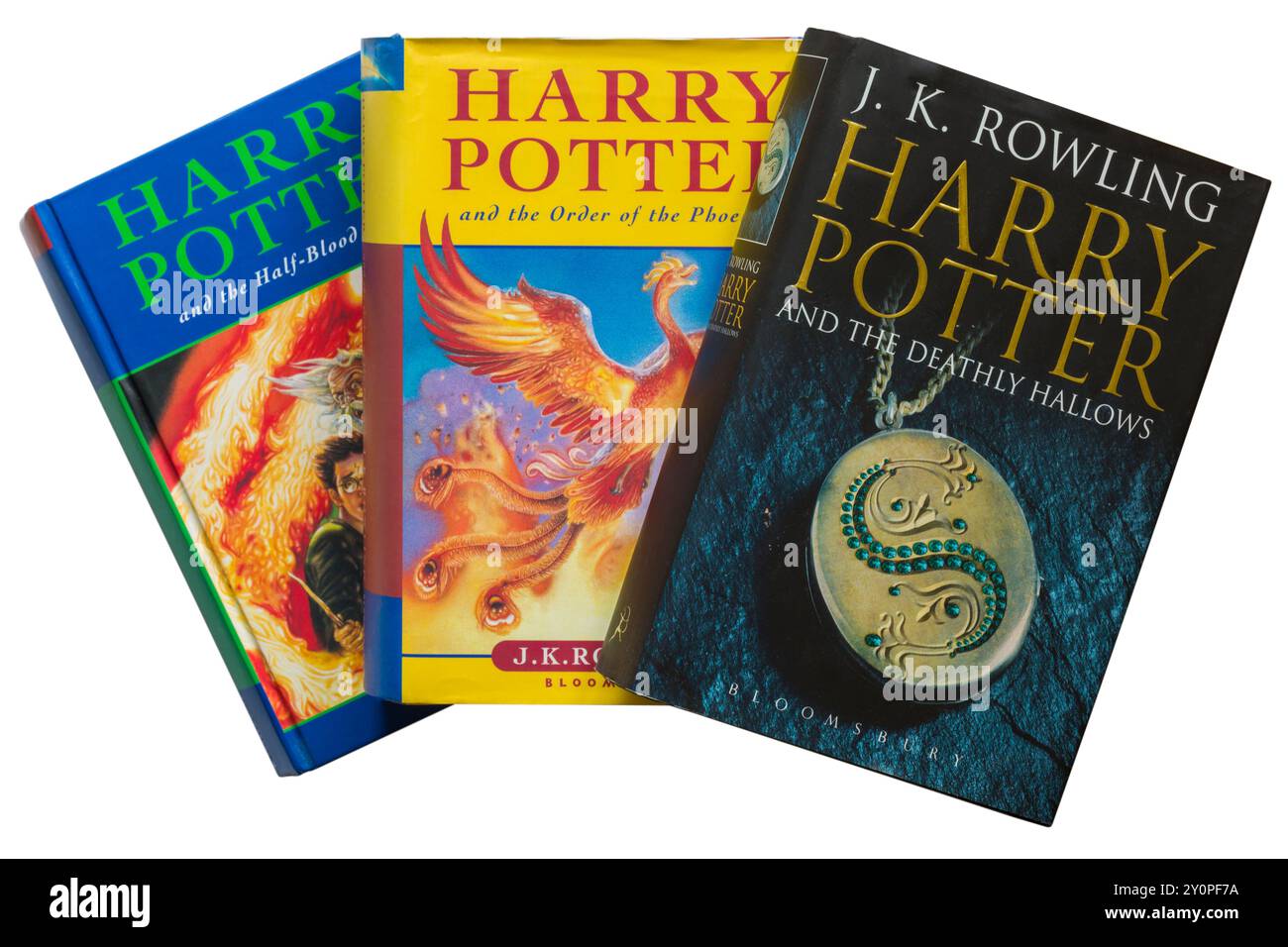 Selection of Harry Potter books by JK Rowling with Harry Potter and the Deathly Hallows book on top isolated on white background Stock Photo