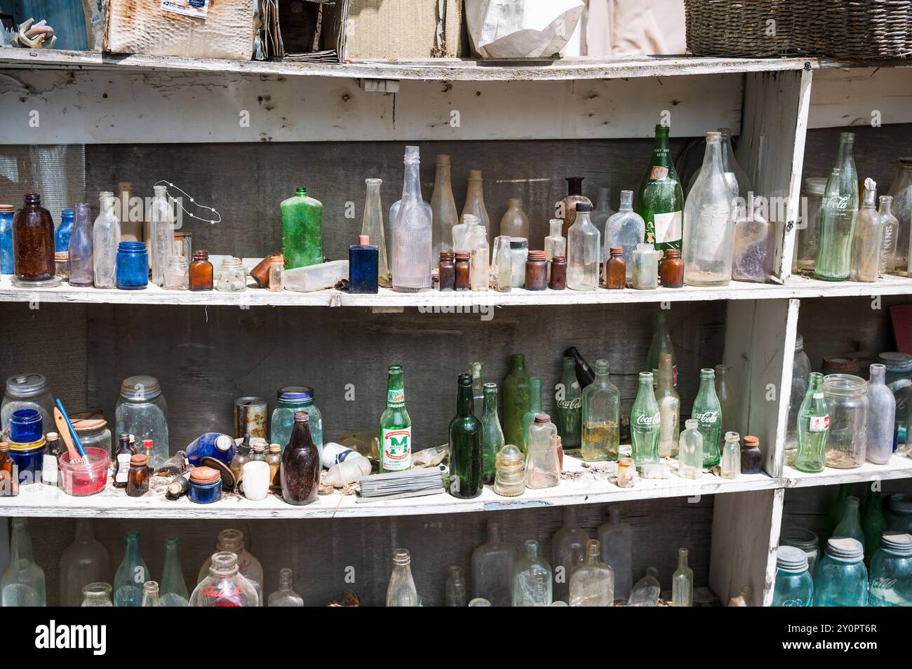 Old bottles for sale at a roadside flea market antique mall.  La Grande Or, USA. Stock Photo