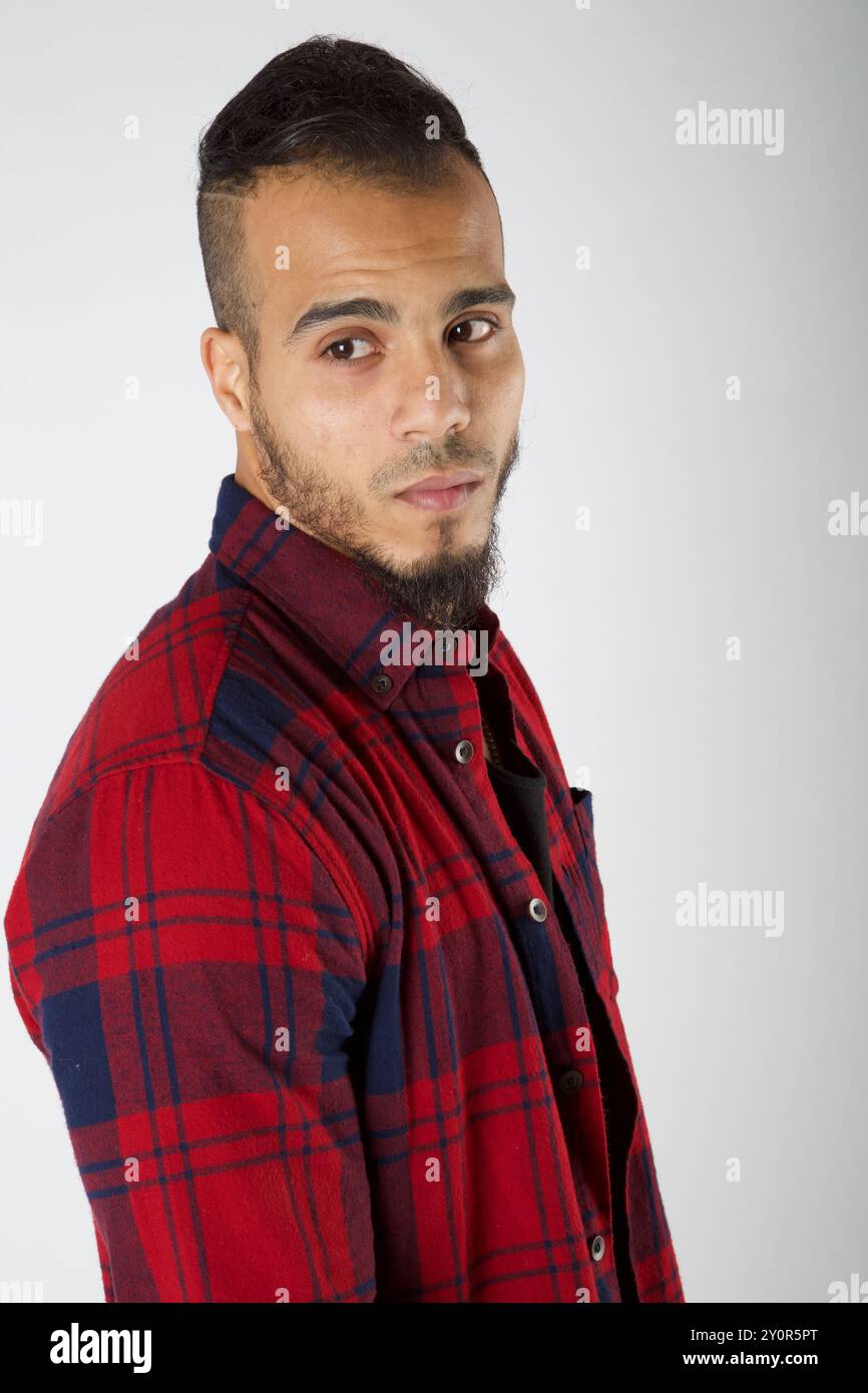 Portrait of a man wearing a plaid check shirt Stock Photo