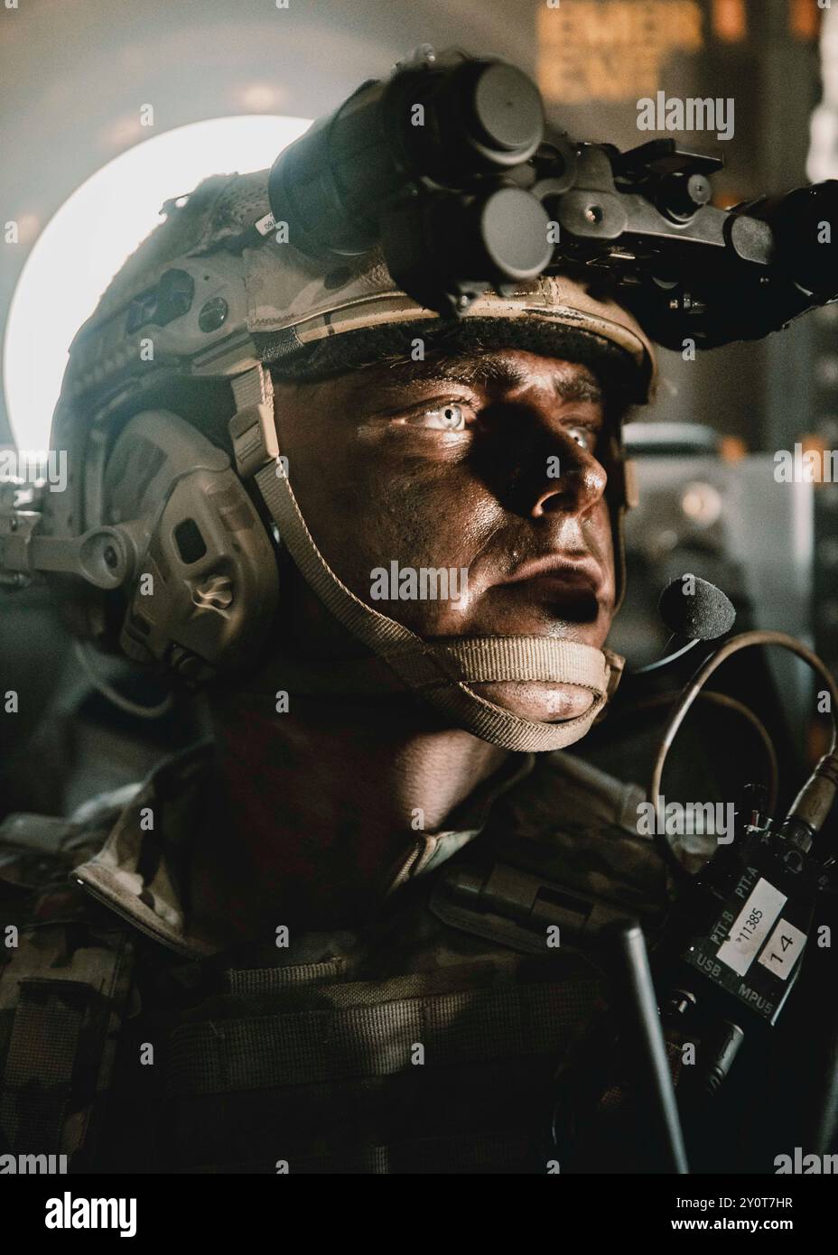 A U.K. Royal Marine Commando assigned to 40 Commando, rides a U.S ...