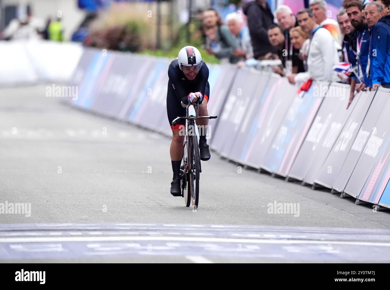 Great Britain's Sarah Storey crosses the finish line to win a gold
