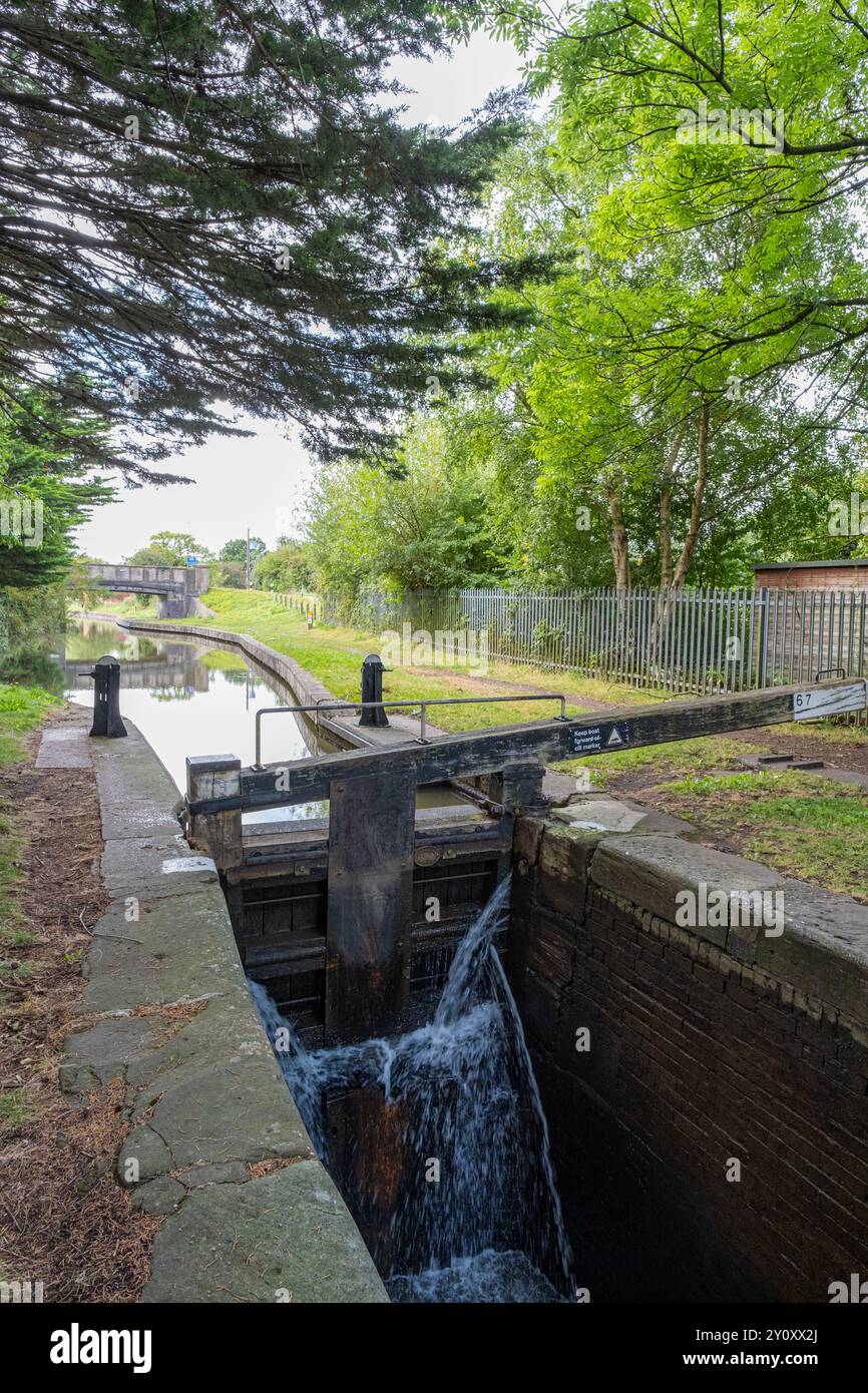 Canal lock 67 on the Trent and Mersey Canal in the Cheshire countryside Stock Photo