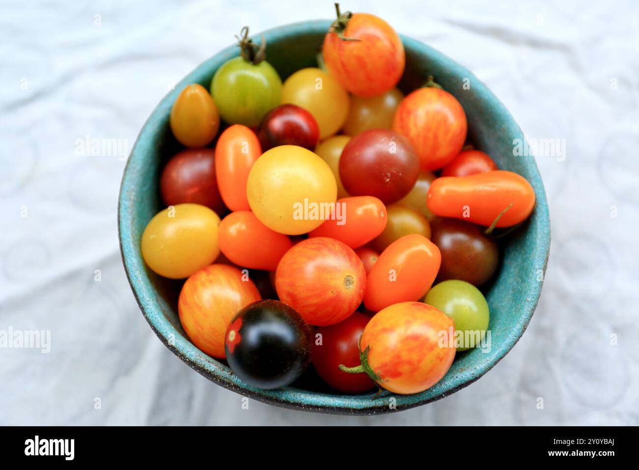 Cherries in dish on the table Stock Photo