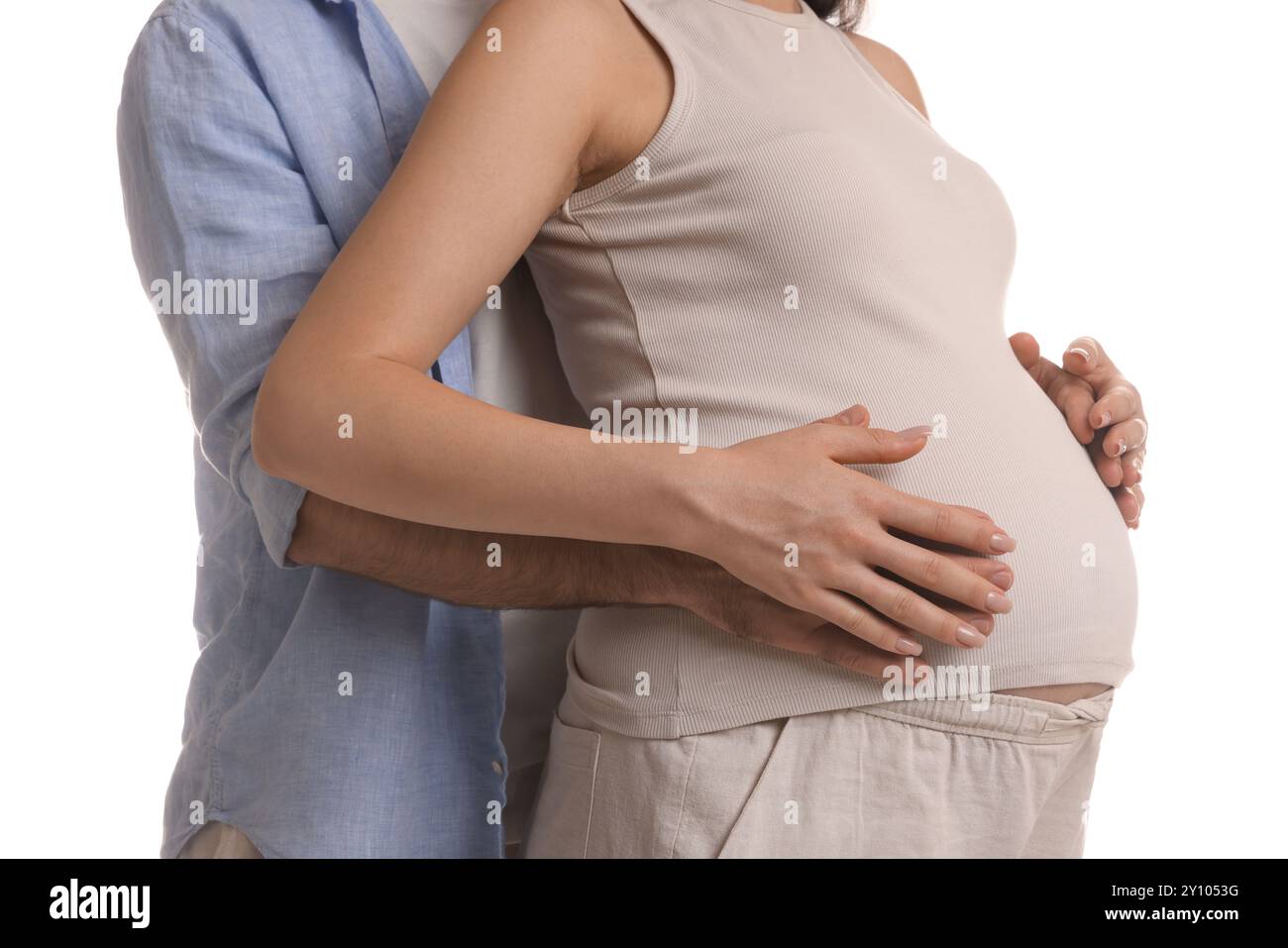 Man hugging her pregnant wife on white background, closeup Stock Photo ...