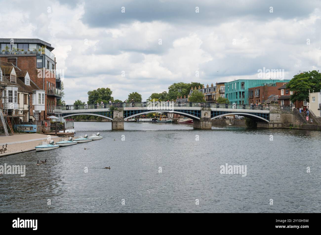 View along River Thames towards Windsor Bridge which links Eton and Windsor Berkshire England UK Stock Photo