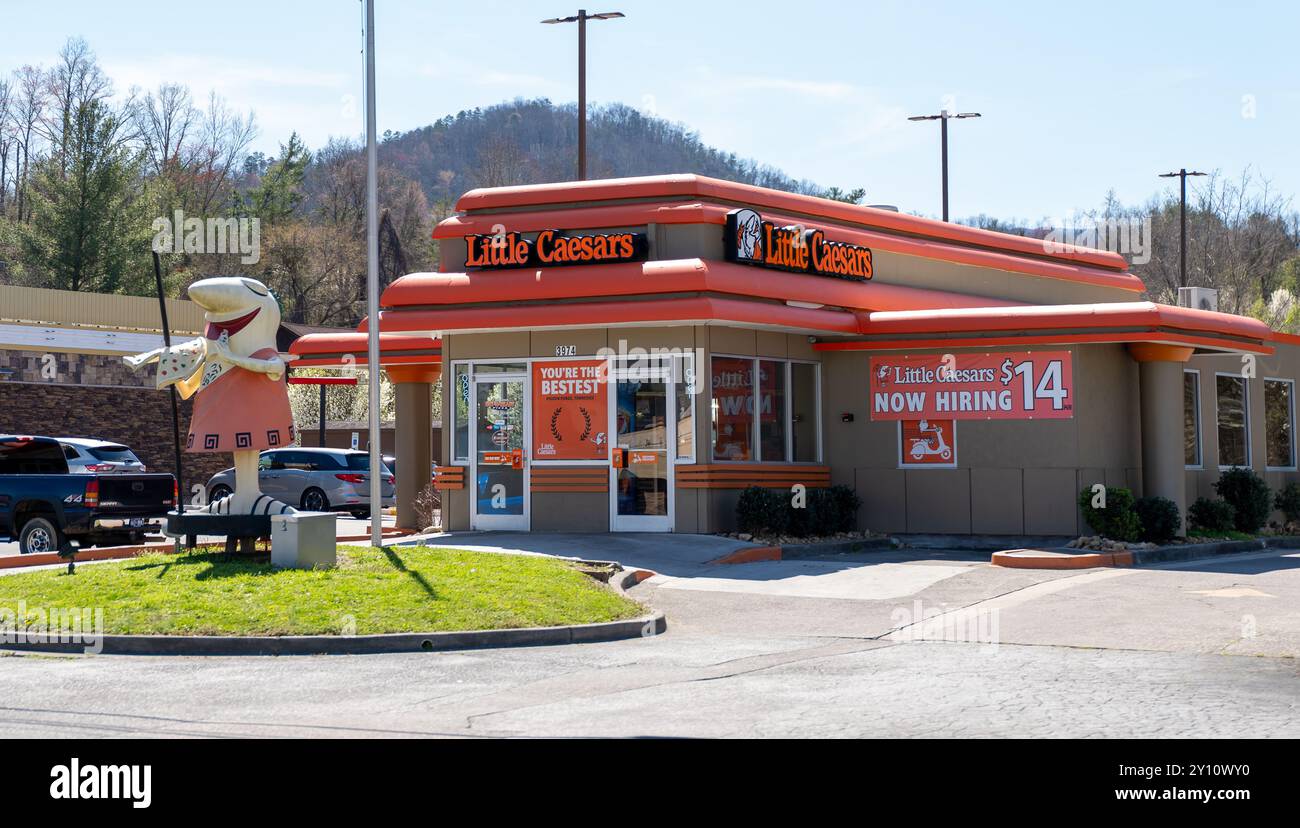 PIGEON FORGE, TN - 12 MAR 2024: Little Caesars building, a carry out chain store featuring chicken wings, breadsticks and pizza tossed from housemate Stock Photo