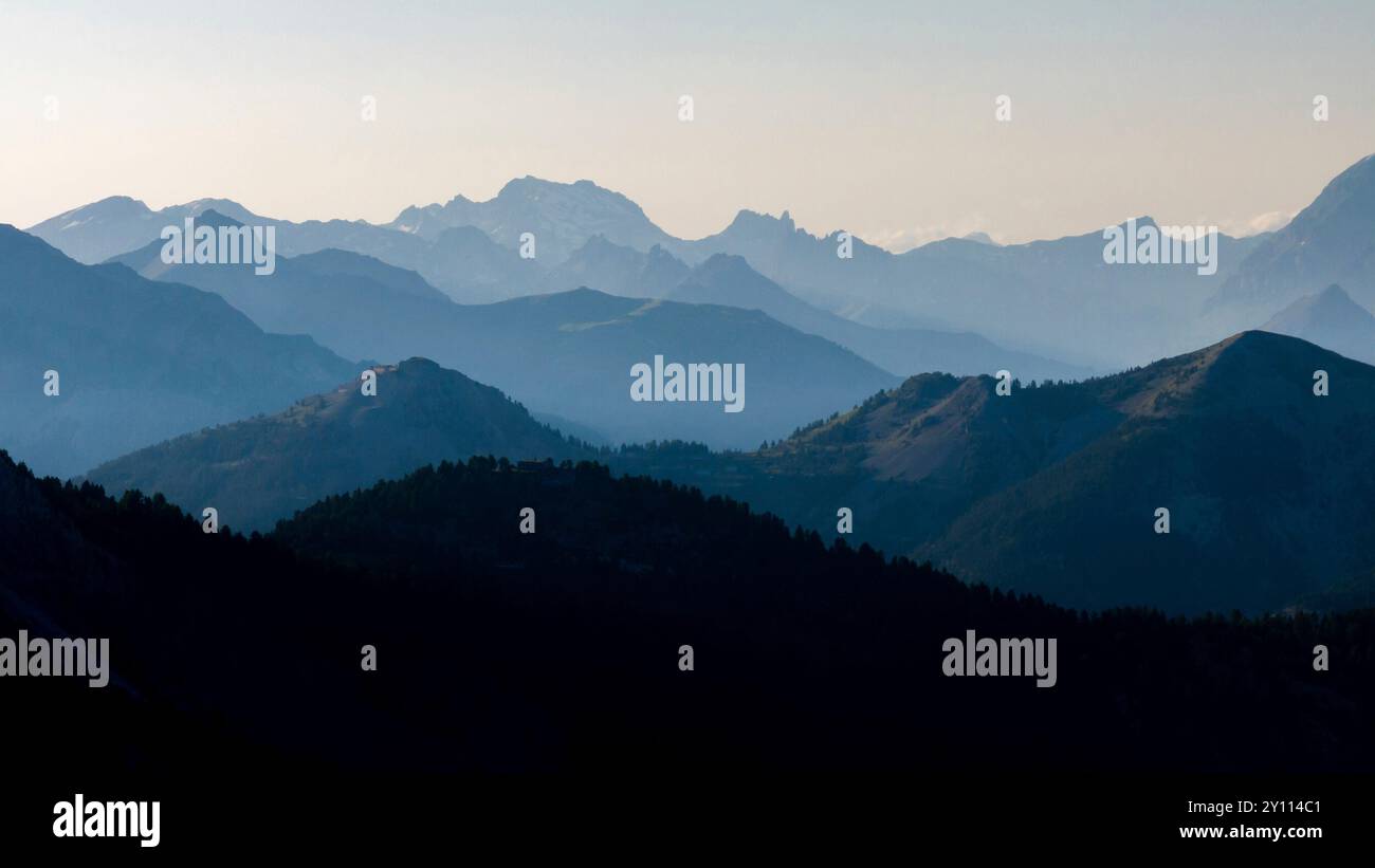 Mountain silhouettes in the fog Stock Photo