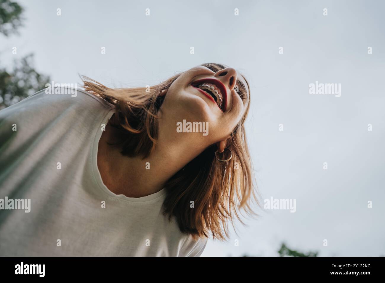 Woman smiling braces on hi-res stock photography and images - Alamy