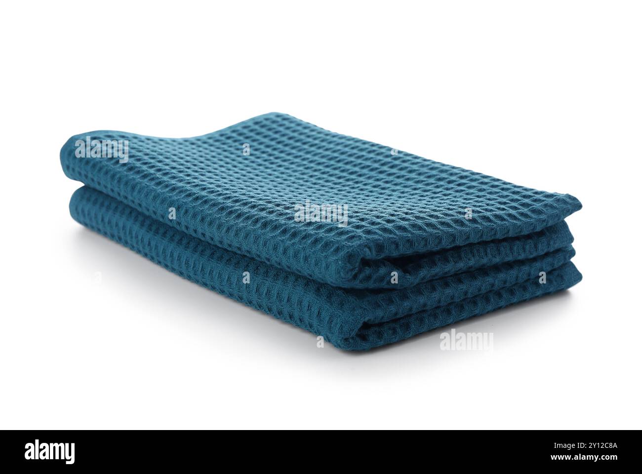 Folded clean towels isolated on white background Stock Photo