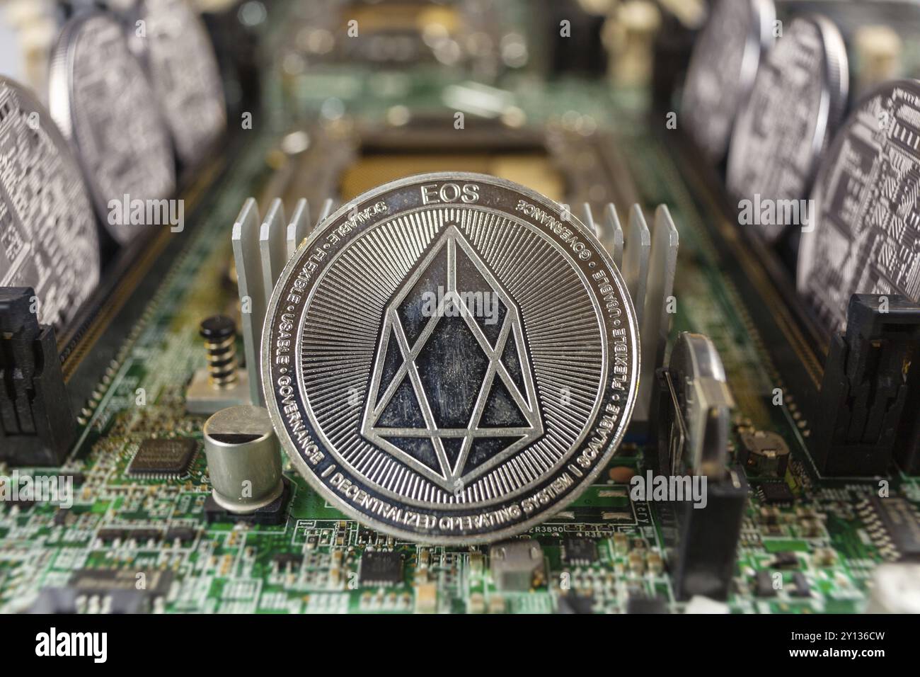 EOS coinclose-up on a computer circuit motherboard as a blockchain  technology payment network. Digital cryptocurrency concept and mining Stock  Photo - Alamy