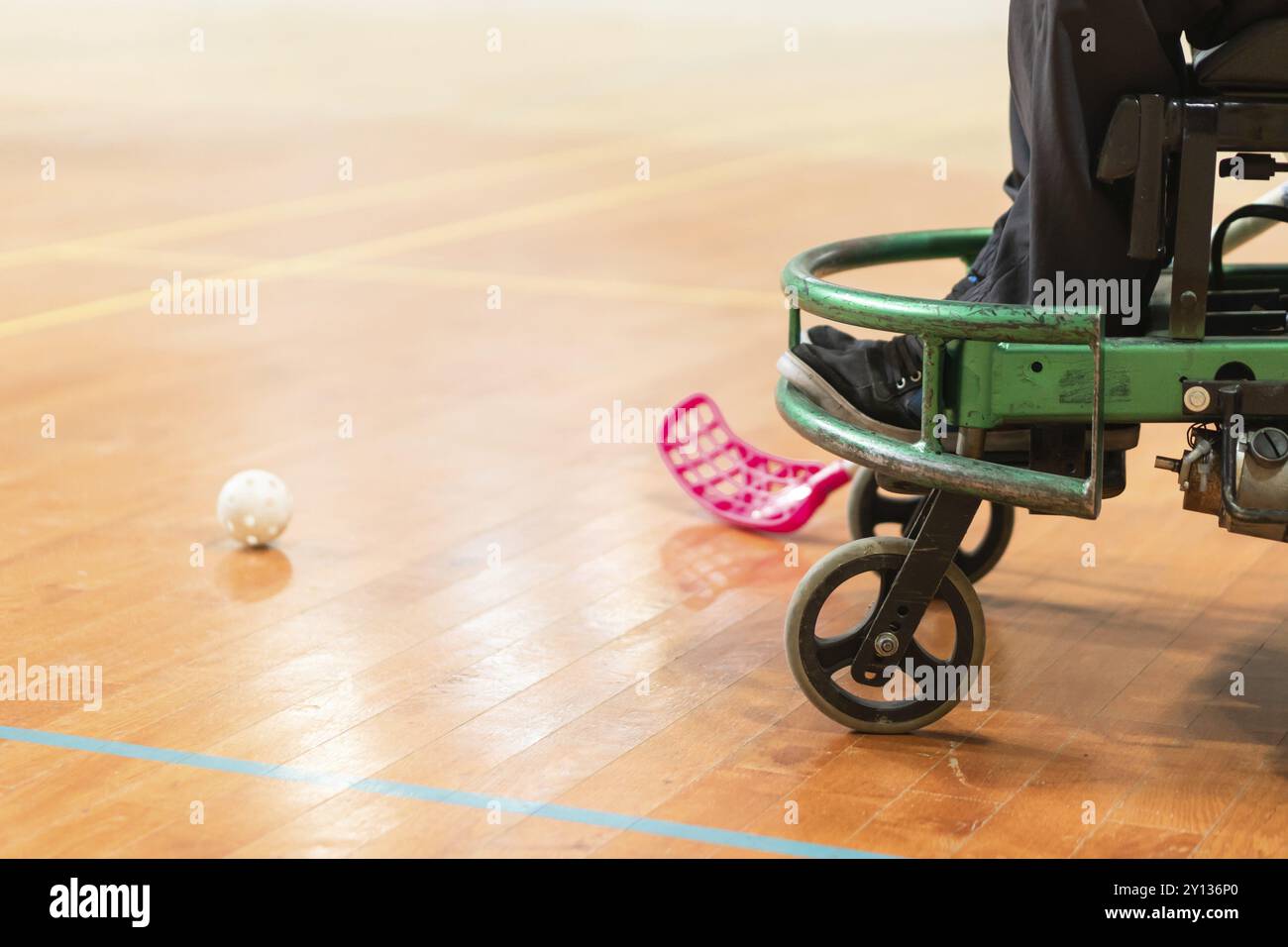 Photo of disabled man on a wheelchair playing sports, hockey, International wheelchair amputee sports IWAS powerchair hockey Stock Photo