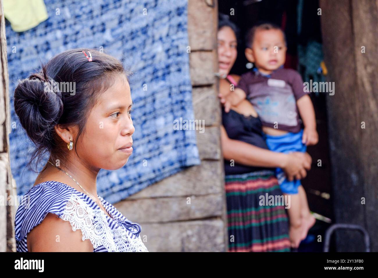 Girls gathered together, Lancetillo-La Parroquia, Zona Reina, Quiche, Guatemala, Central America. Stock Photo