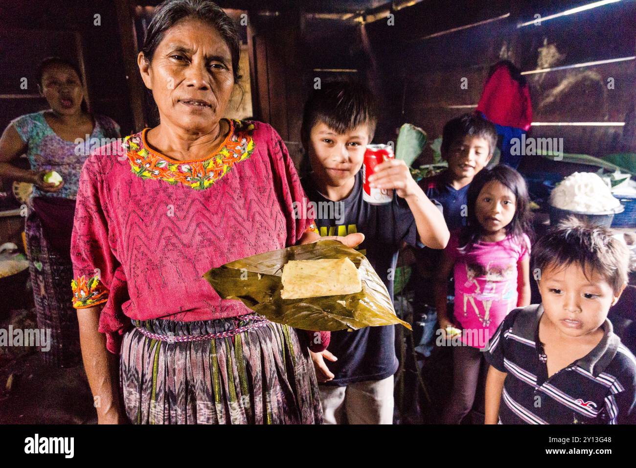 Preparing tamales for a celebration, Lancetillo, La Parroquia, Reyna area, Quiche, Guatemala, Central America. Stock Photo