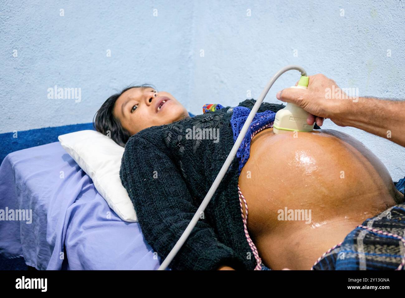 External cephalic version maneuver, Taña health center, Quiche, Republic of Guatemala, Central America. Stock Photo