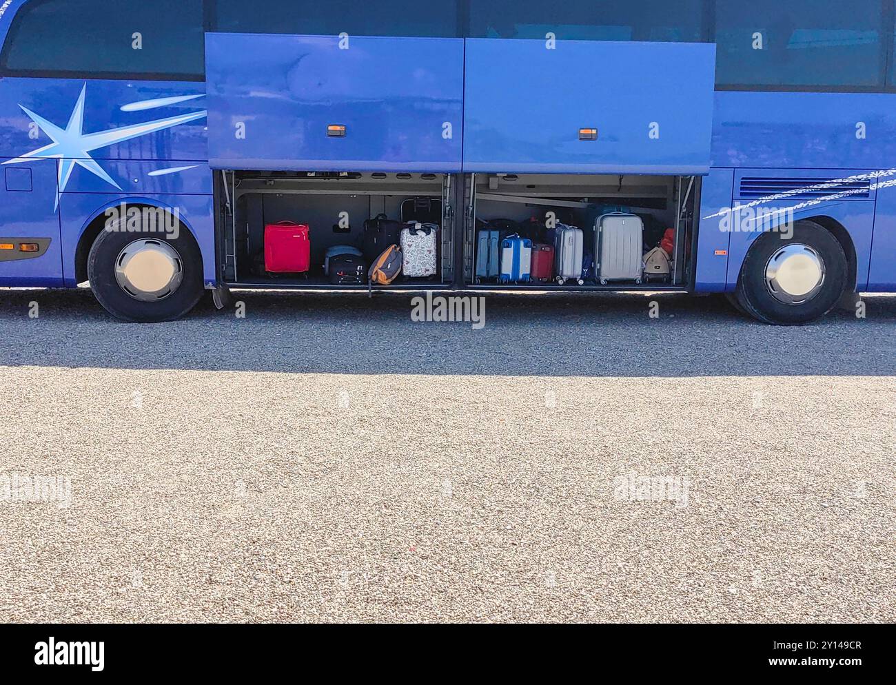 'Pack Your luggage': Open Compartments Filled with Travel Bags – The End of Summer Journey Stock Photo