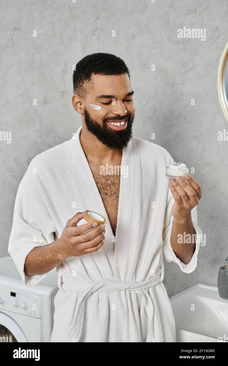 Man in robe enjoying hi-res stock photography and images - Alamy