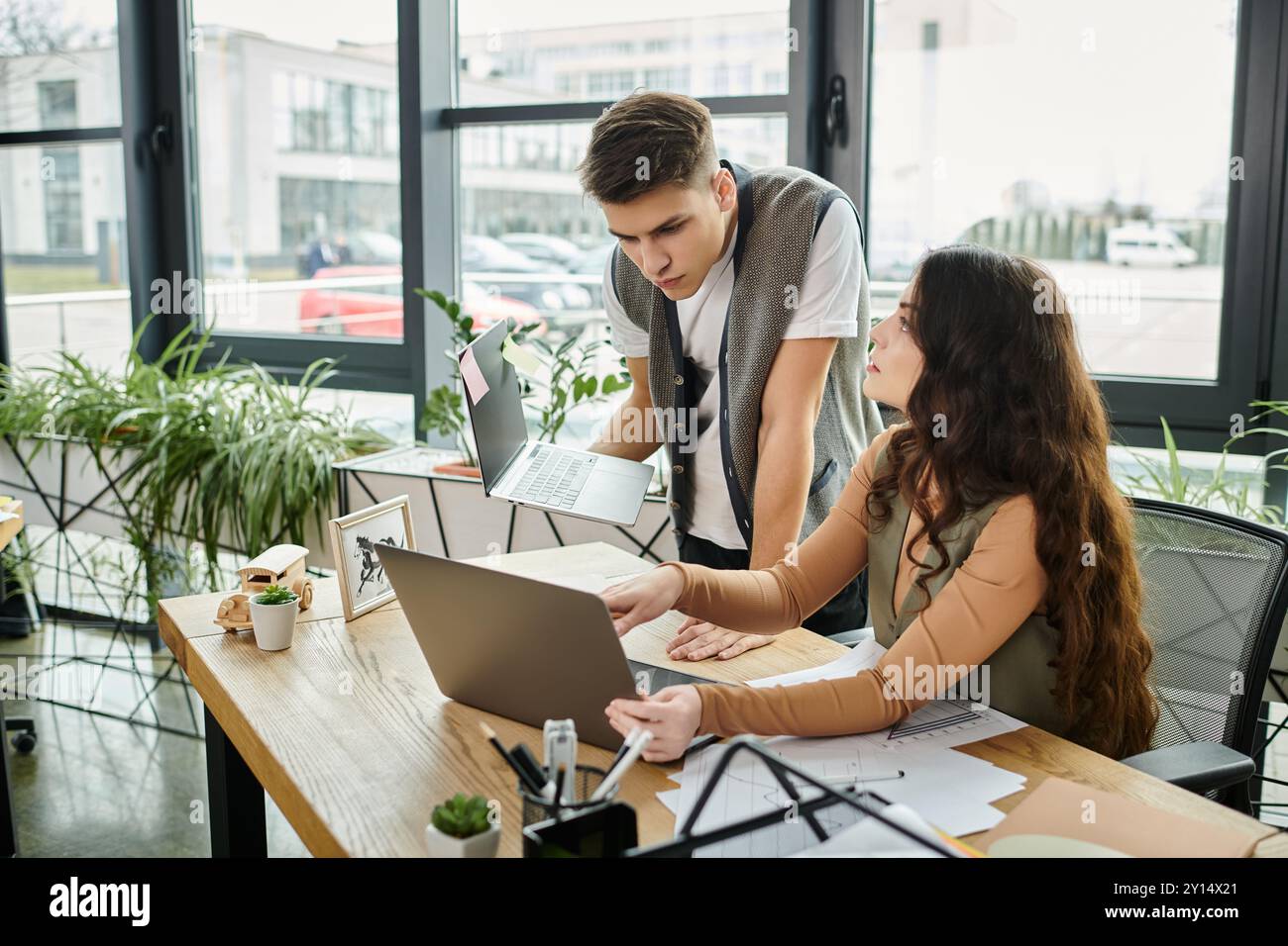 Professionals engage in important discussions while dressed casually and elegantly. Stock Photo