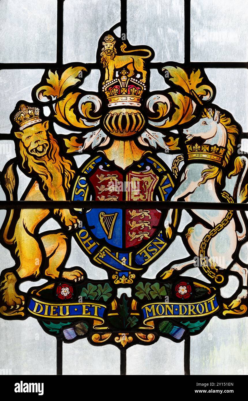 The Royal Coat of Arms on a stained glass window in St Michael's Church, Shap, Westmorland & Furness, Cumbria, UK Stock Photo