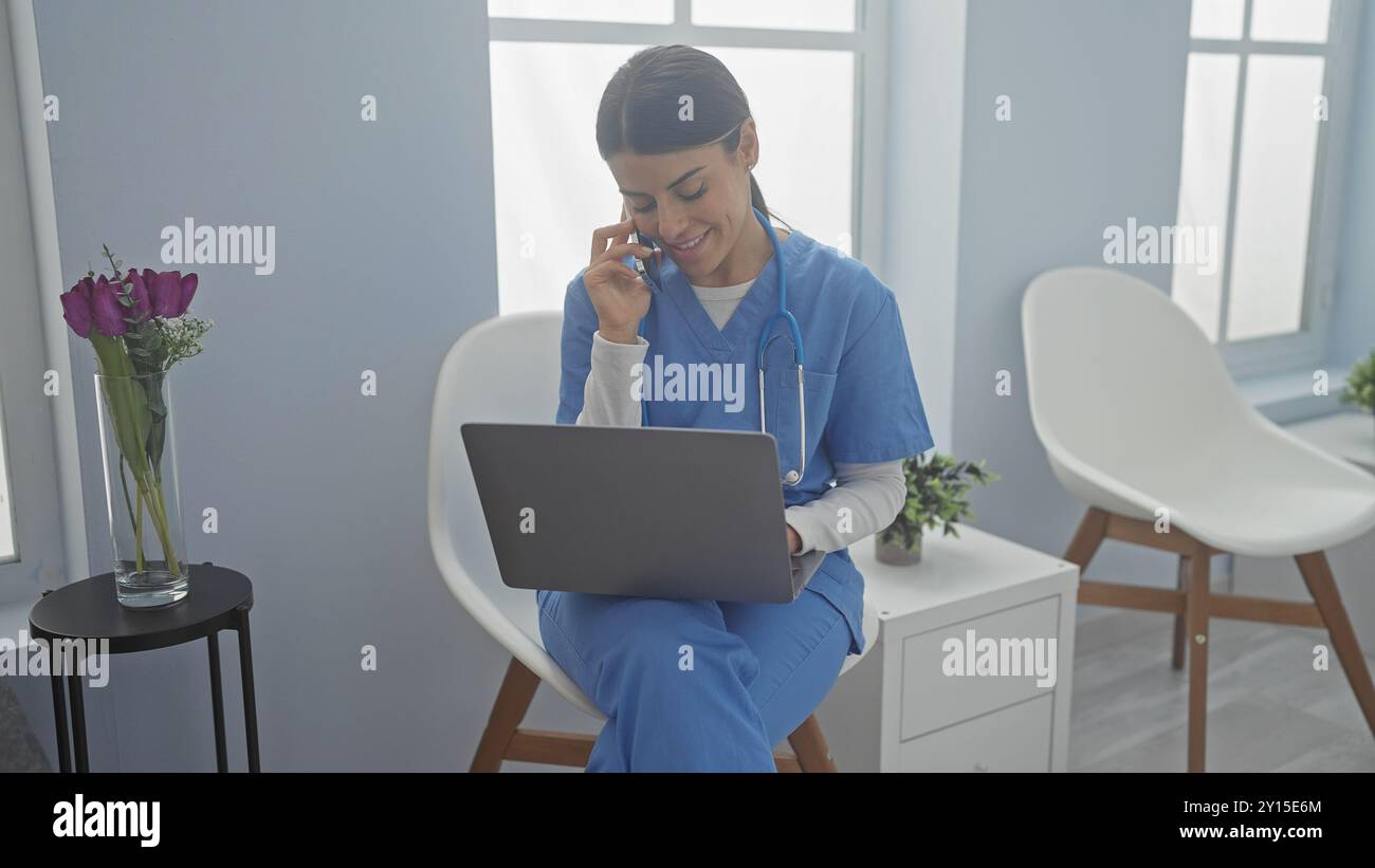 Female nurse laptop hospital scrubs hi-res stock photography and images ...