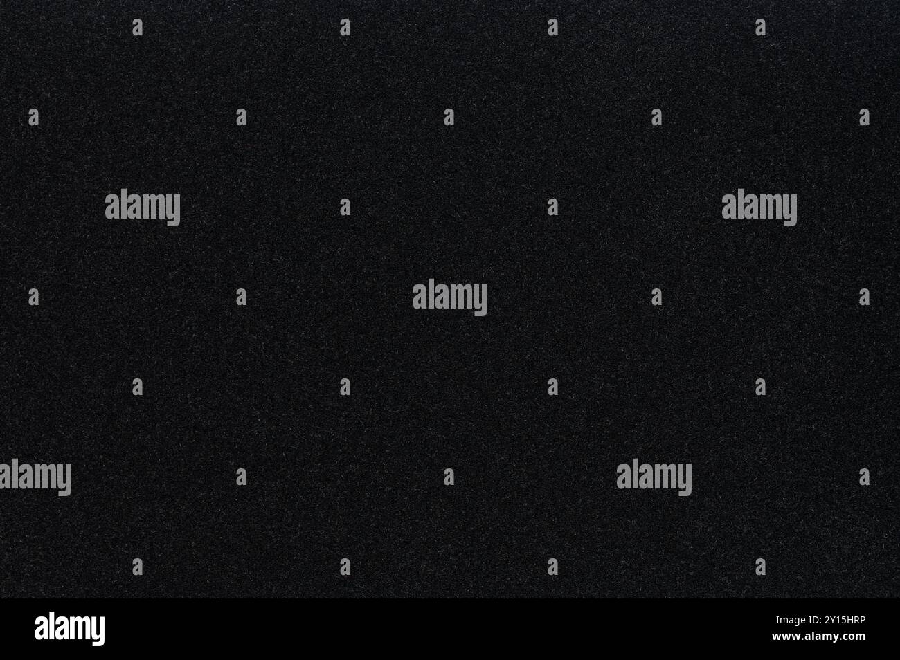 Black matte sparkle polystyrene texture background close up view Stock Photo