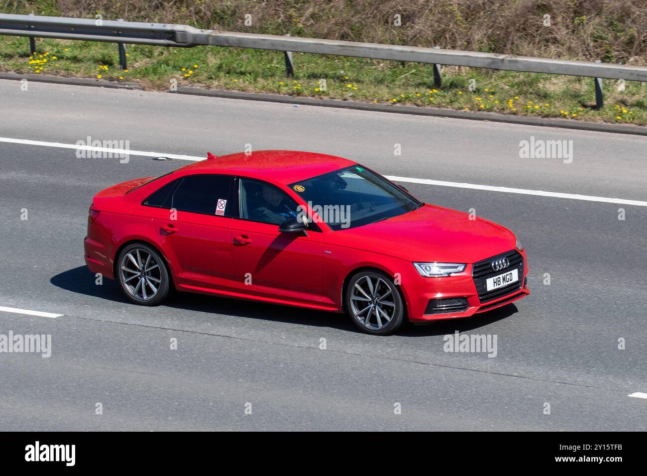 2017 Red Audi A4 S Line TDI S-A; motoring on the M6, UK Stock Photo