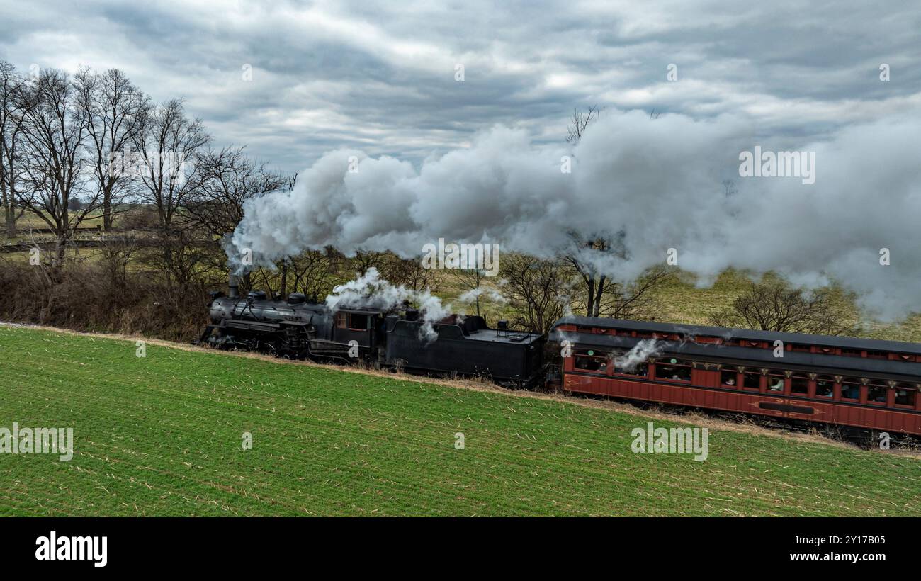 Vintage steam locomotive chugs along hi-res stock photography and ...