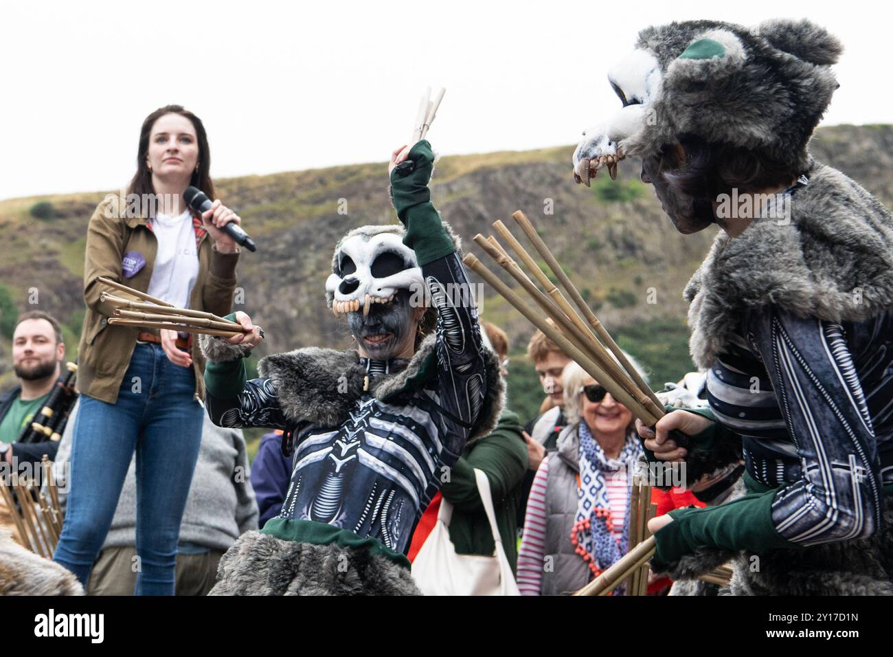 Surge Scotland performing a funereal excerpt from their large-scale street spectacle and musical pandemonium show 'Beautiful Bones', as part of a protest outside Scottish Parliament on 5 September 2024 in response to Creative Scotland announcing its decision on 19 August to abolish its fund for individual arts professionals due to funding constraints from the Scottish government; an announcement was made late on 4 September that the fund would be reinstated, however there are ongoing concerns about the future of arts funding in Scotland. This protest was organised by STUC (Scottish Trades Unio Stock Photo