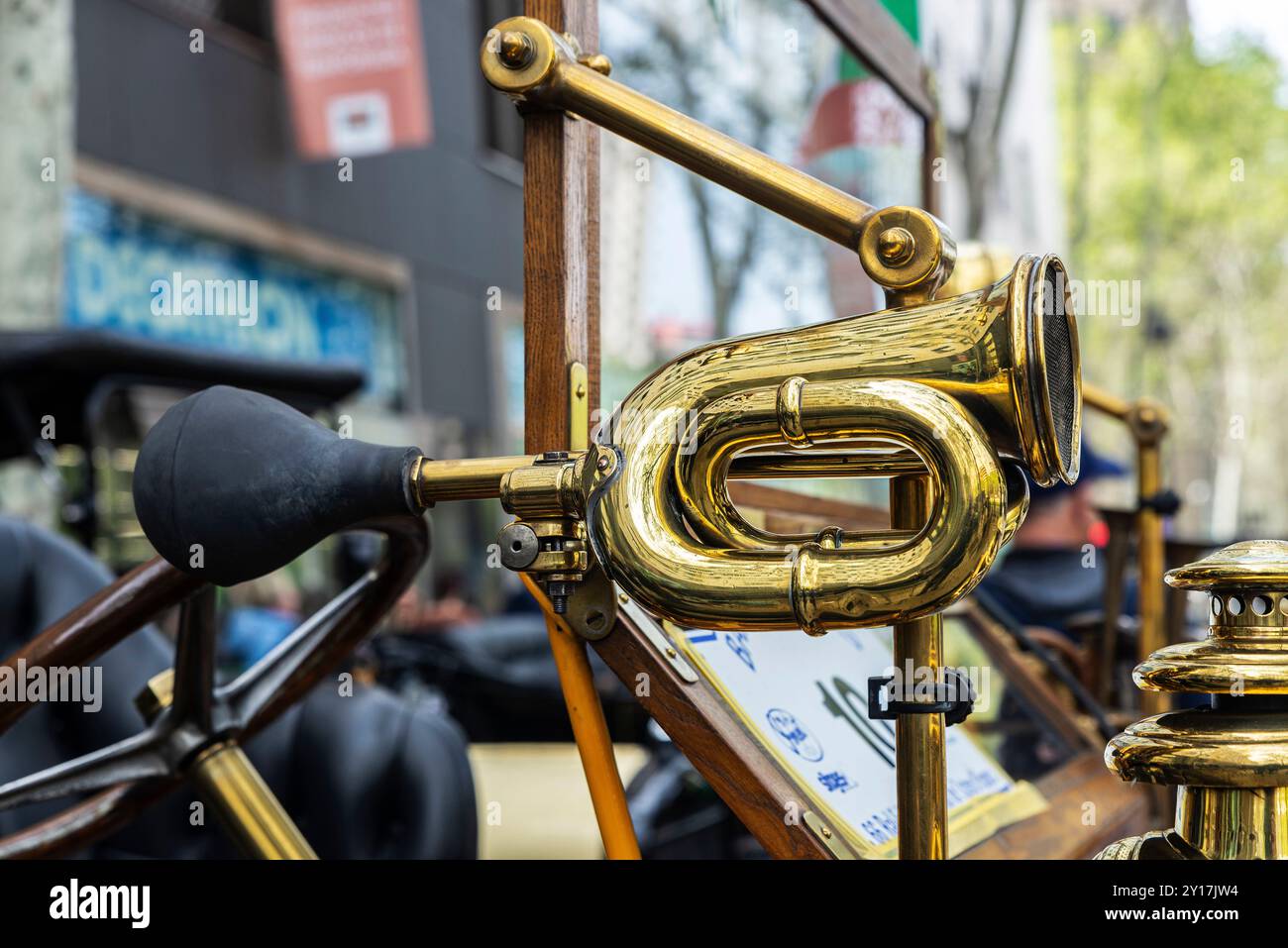 Barcelona, Spain - April 6, 2024: Golden horn of an old retro car from the 1920s of the brand Reyrol of 1909 parked on a street in Barcelona, Cataloni Stock Photo