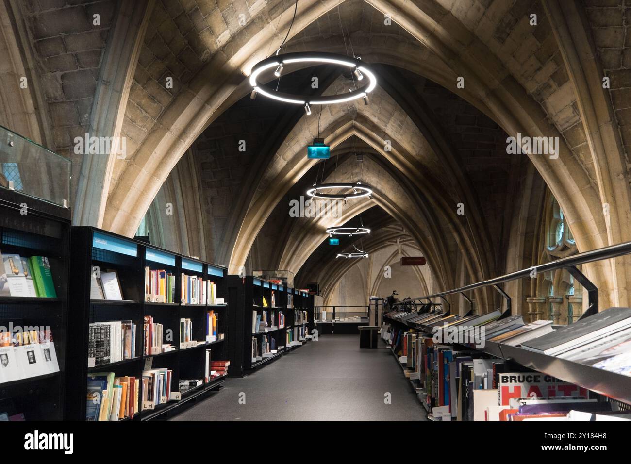 Interior of Dominican church converted into a bookstore. Cathedral ceilings and pillars of the church in Maastricht Stock Photo
