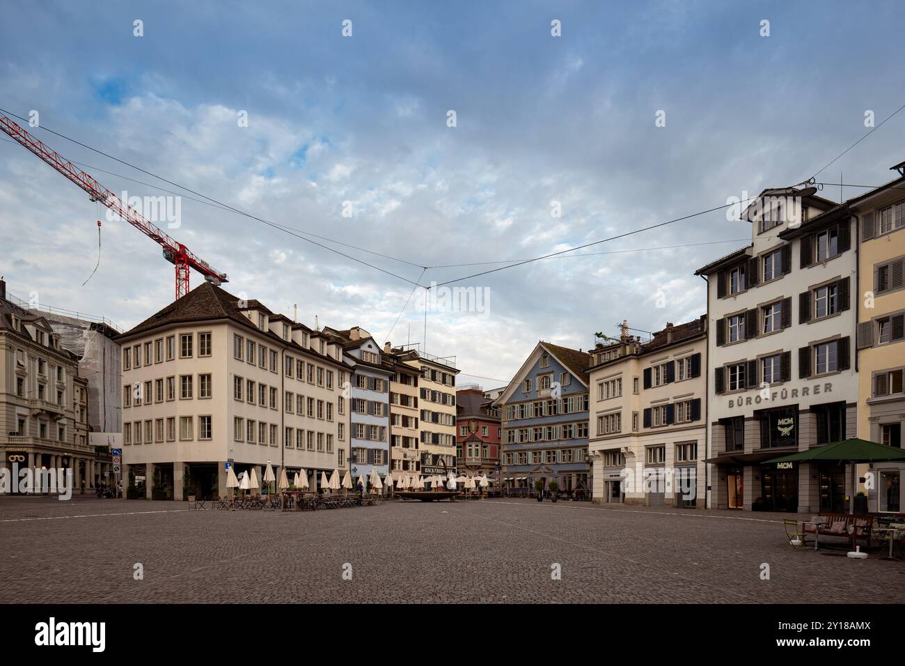 03-09-2024 Zurich, Switzerland. Empty Münsterhof or Munster square on a summer early morning, no people. Stock Photo