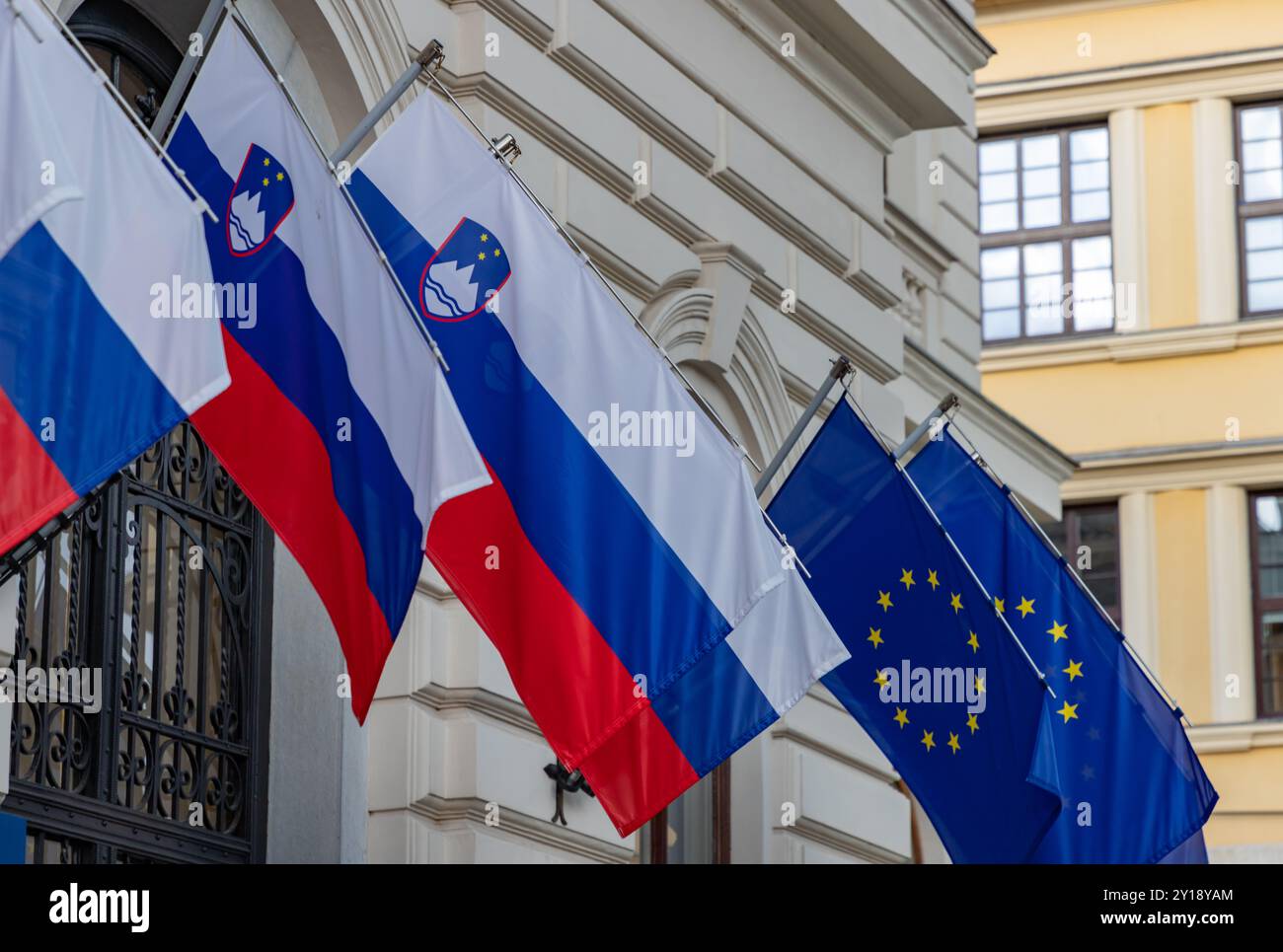 A picture of multiple Slovenian and European Union flags. Stock Photo