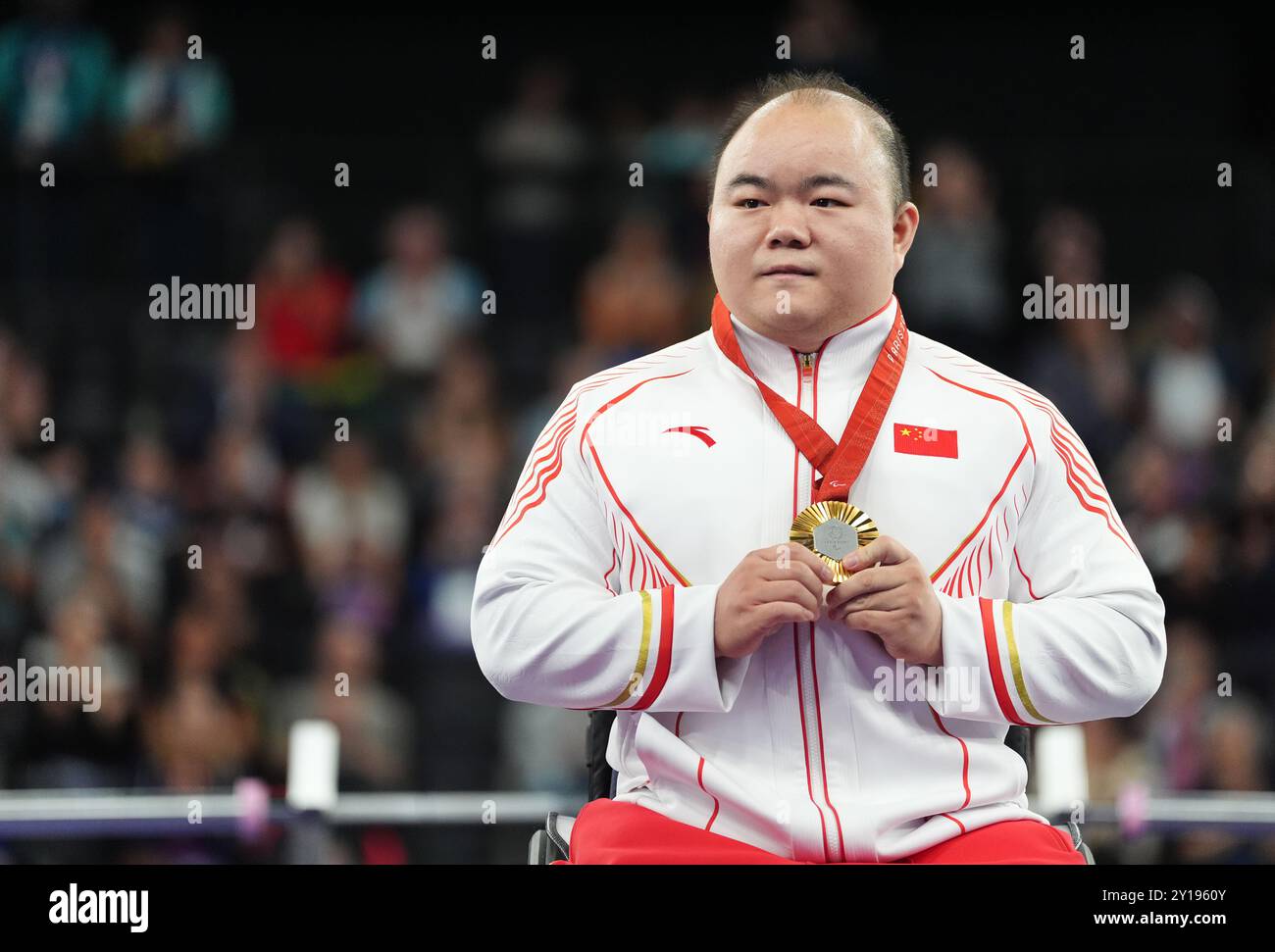 Gold Medallist China’s Yi Zou after the Men’s up to 65kg Final at La ...